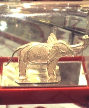 Elephant(in a glass box), made of silver